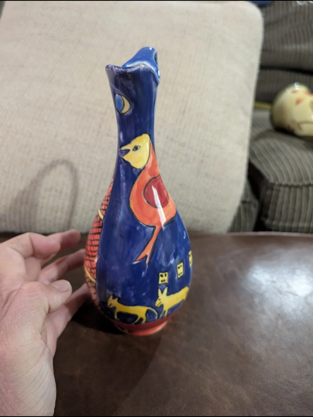 Hand-Painted Blue Ceramic Vase with Yellow and Red Folk Art Motif
